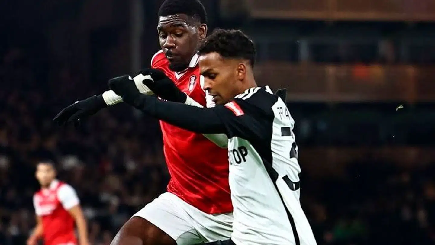 Fulham's Australian midfielder #35 Tyrese Francois (R) vies with Rotherham's Ivorian midfielder #27 Christ Tiehi (L) during the English FA Cup third round football match between Fulham and Rotherham United at Craven Cottage in London on January 5, 2024. Fulham won the game 1-0. (Photo by HENRY NICHOLLS / AFP) / RESTRICTED TO EDITORIAL USE.No use with unauthorized audio, video, data, fixture lists, club/league logos or 'live' services. Online in-match use limited to 120 images. An additional 40 images may be used in extra time.No video emulation. Social media in-match use limited to 120 images. An additional 40 images may be used in extra time.No use in betting publications, games or single club/league/player publications. /