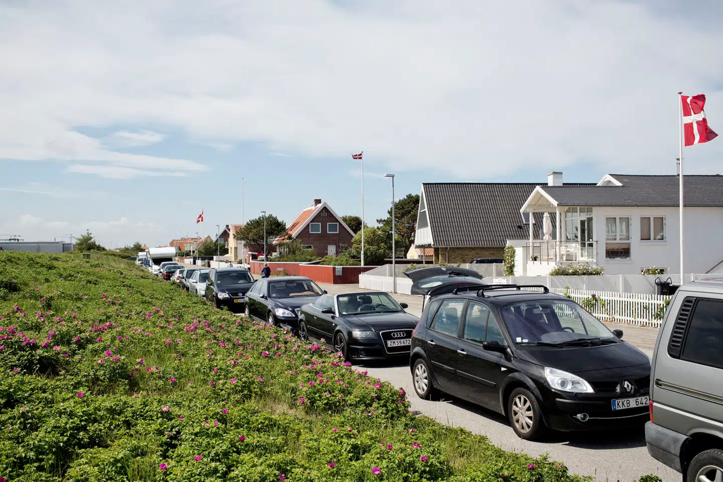 En læser er i tvivl om, hvordan udgifterne må deles, når forældrene og børnene ikke ejer lige meget af deres fælles sommerhus.