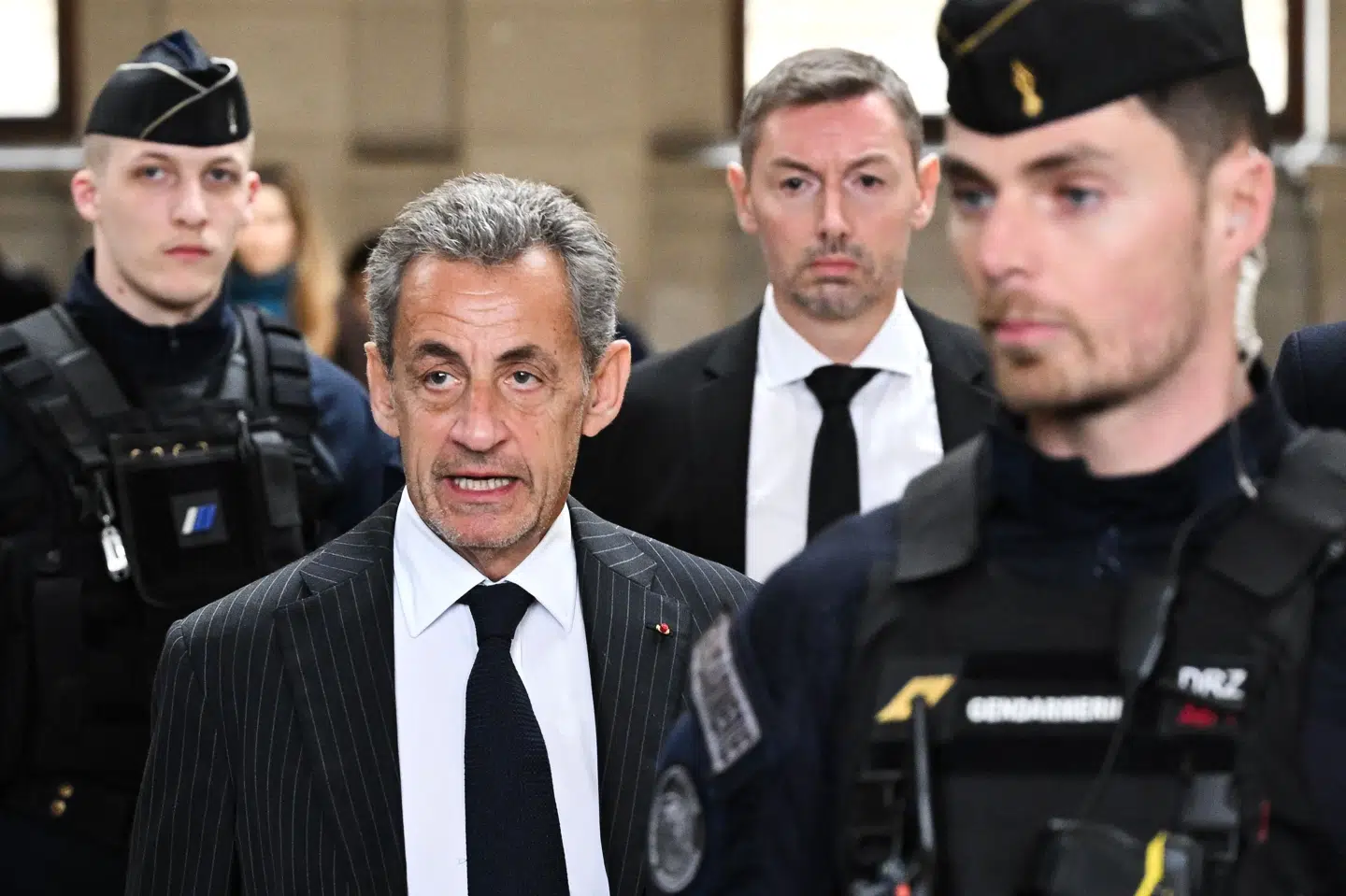 Frankrigs tidligere præsident Nicolas Sarkozy ankommer til retten i Paris onsdag, hvor en appeldomstol skulle tage stilling til hans anke i en sag om ulovlig finansiering af valgkamp.