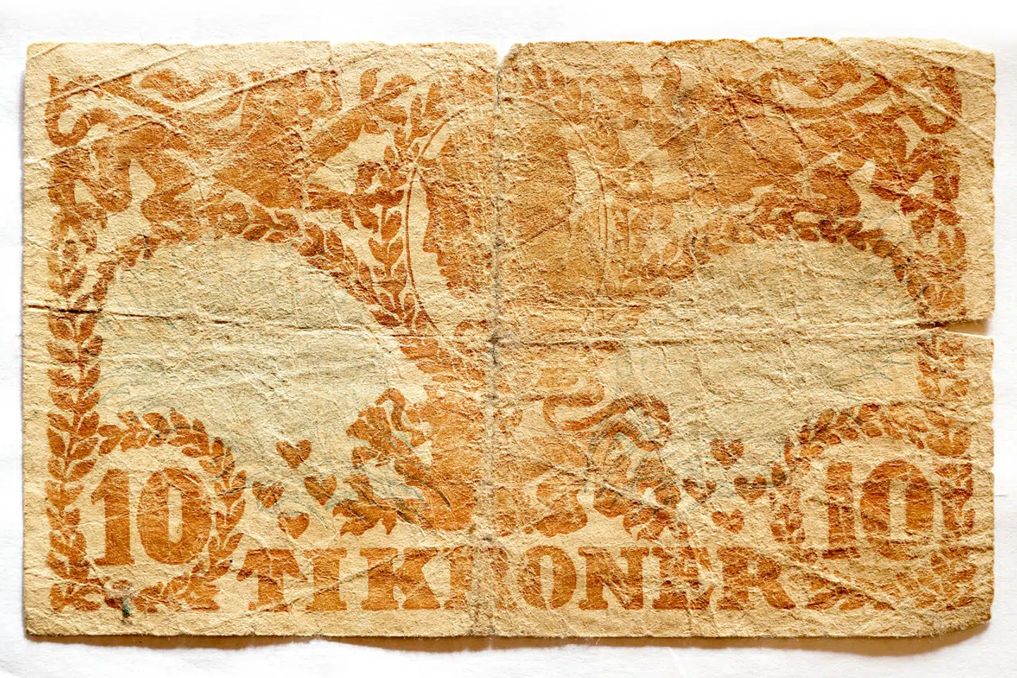 Familien Hansen trykkeri på Nørrebro blev ikke kun brugt til lovlige opgaver. Her en af de falske pengesedler, som hans forfædre stod bag.