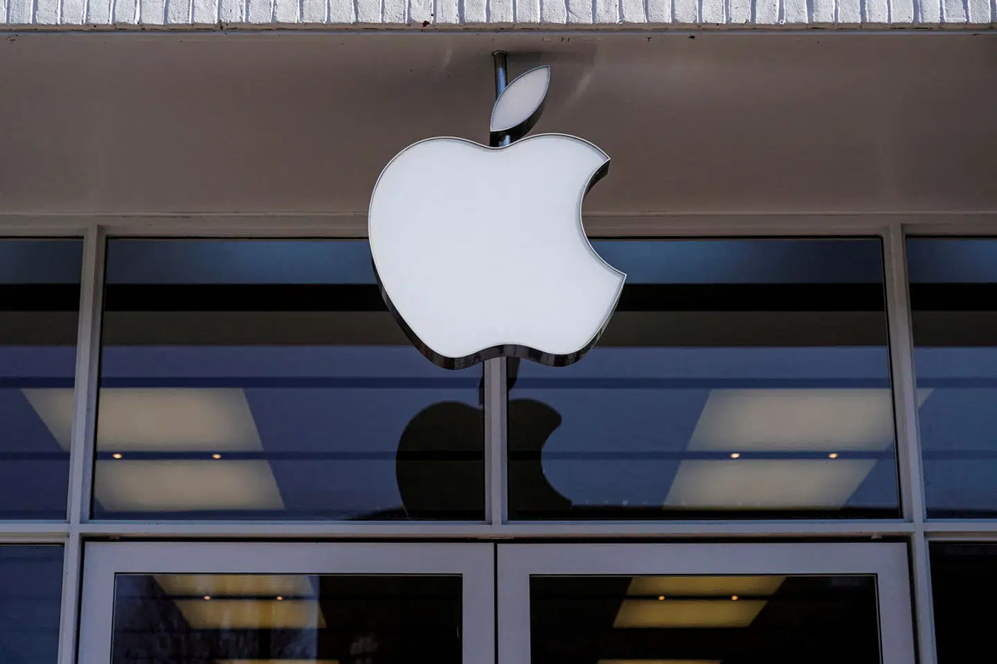 FILE PHOTO: Logo of an Apple store is seen as Apple Inc. reports fourth quarter earnings in Washington, U.S., January 27, 2022. REUTERS/Joshua Roberts/File Photo