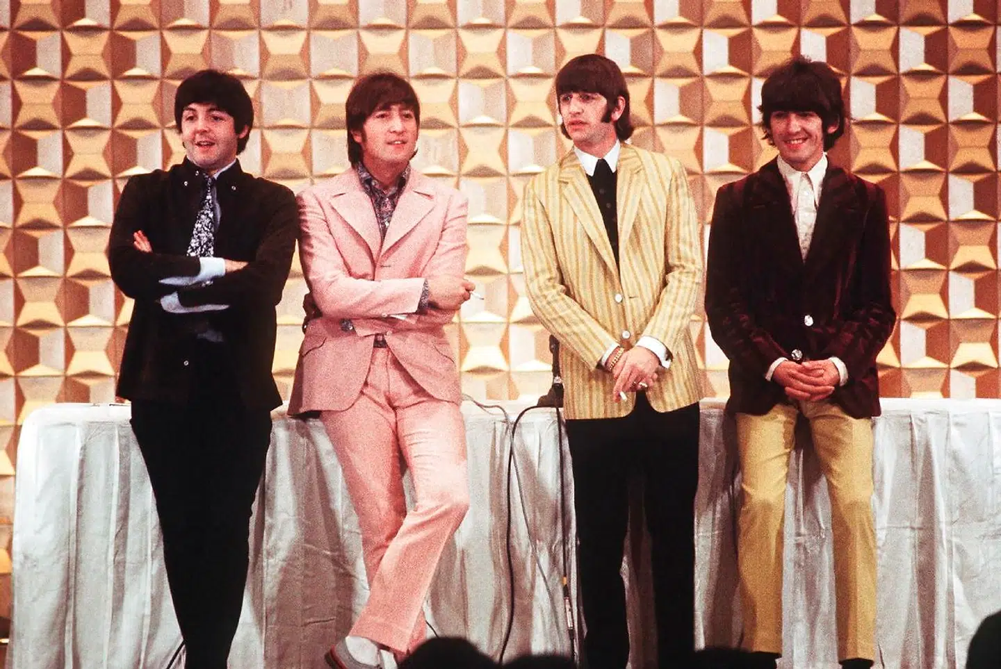 This photo taken on June 29, 1966 shows members of the British band The Beatles, (L to R) Paul McCartney, John Lennon, Ringo Starr and George Harrison, holding a press conference in Tokyo at the start of their tour. - A group of Japanese Beatles fans on October 30, 2018 have lost their bid to get police to hand over historic footage of the band's legendary 1966 Japan visit. (Photo by JIJI PRESS / JIJI PRESS / AFP) / Japan OUT