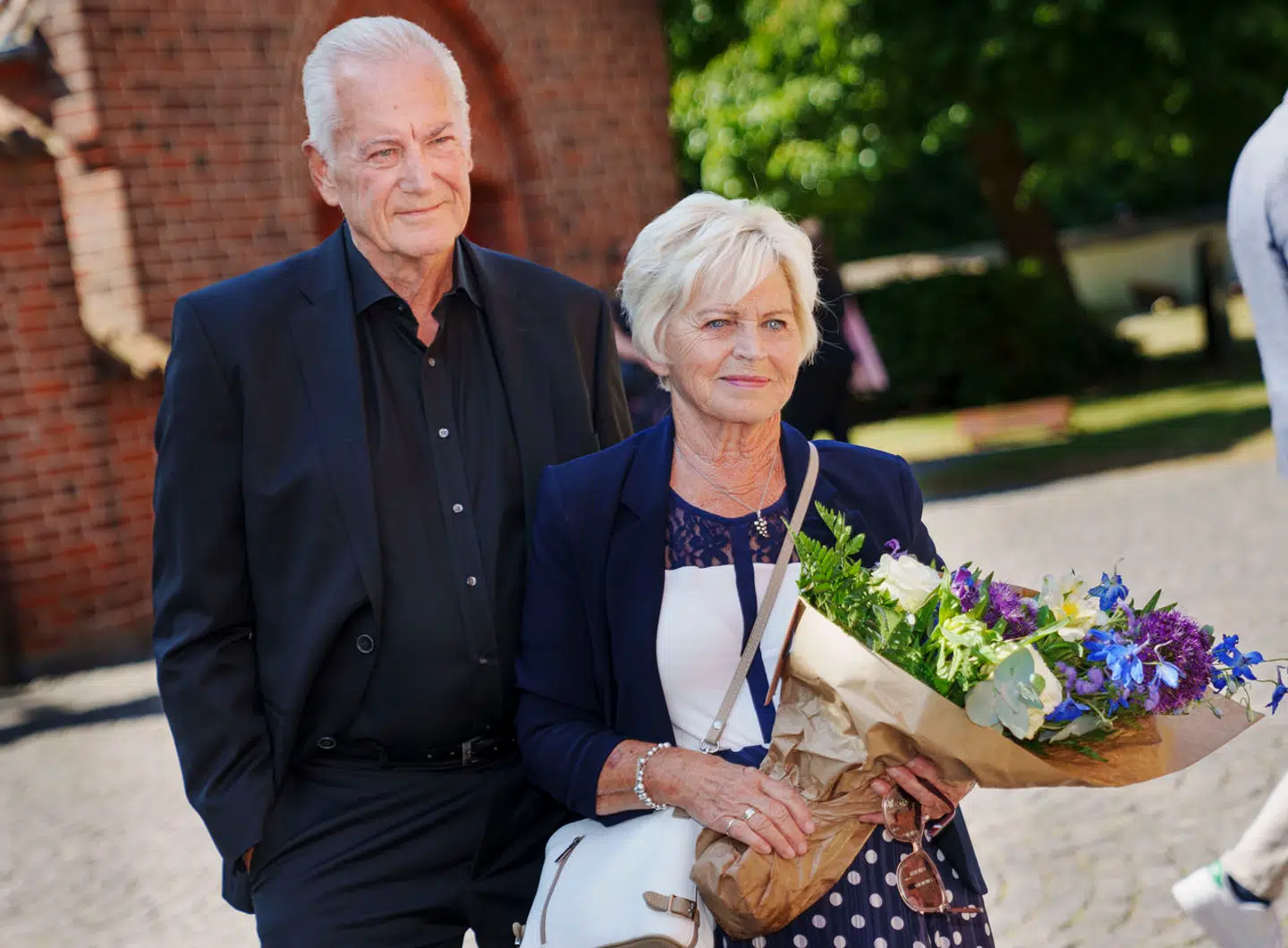 Keld og Hilda Heick til Peter Bellis begravelse fra Brøndbyvester Kirke, onsdag den 14. juni 2023.