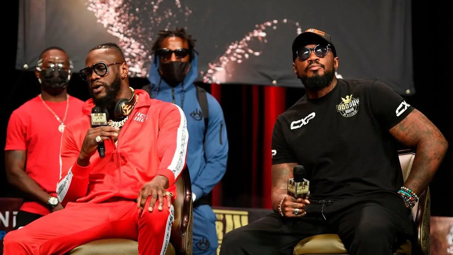 Malik Scott (til højre) er nu træner for boksestjernen Deontay Wilders (til venstre).