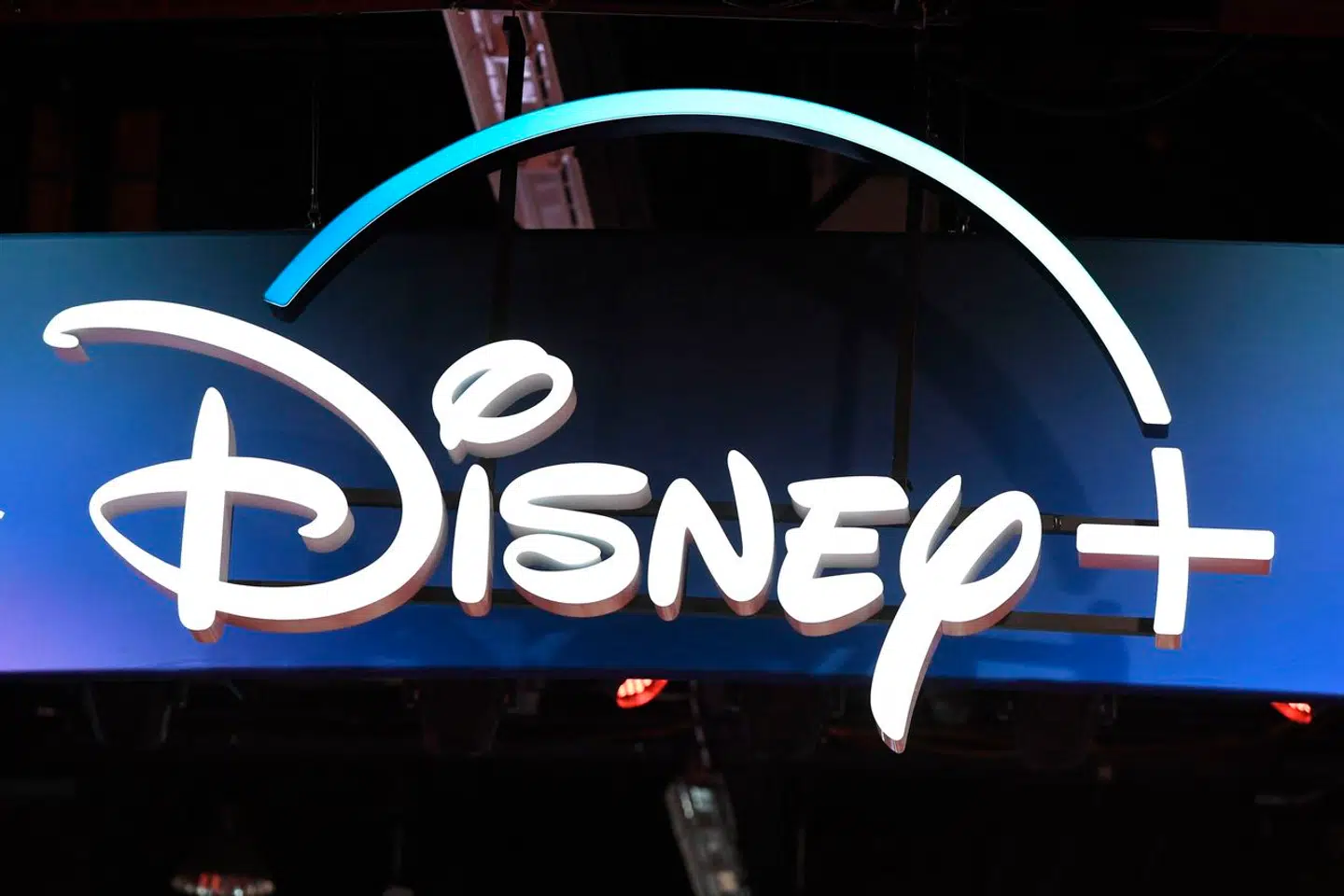 (FILES) A Disney+ streaming service sign is pictured at the D23 Expo, billed as the "largest Disney fan event in the world, " on August 23, 2019 at the Anaheim Convention Center in Anaheim, California. Disney on February 7, 2024 reported higher than expected profit in the final three months of last year despite a slip in the number of subscribers to its streaming service. (Photo by Robyn Beck / AFP)