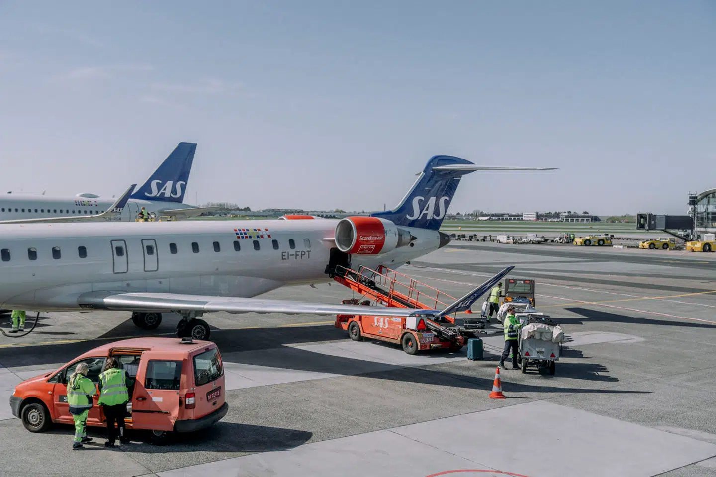 Københavns Lufthavn oplever forsinkelser grundet en arbejdsnedlæggelse fra bagagepersonalet.