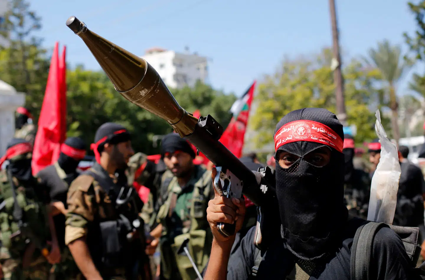 Maskerede og bevæbnede medlemmer af DFLP i Gaza City i 2014.