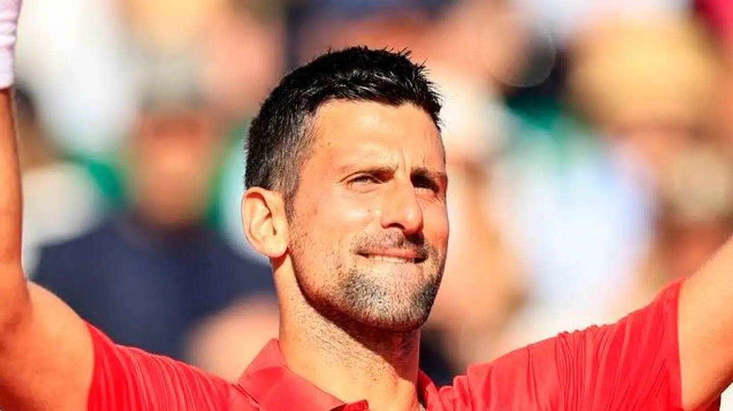 Serbia's Novak Djokovic celebrates after winning against Italy's Lorenzo Musetti during their Monte Carlo ATP Masters Series Tournament round of 16 tennis match on the Rainier III court at the Monte Carlo Country Club on April 11, 2024. (Photo by Valery HACHE / AFP)
