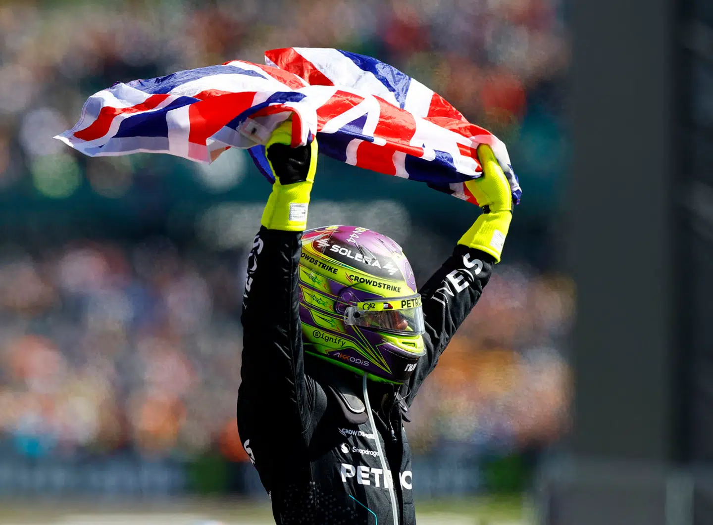 Formula One F1 - British Grand Prix - Silverstone Circuit, Silverstone, Britain - July 7, 2024 Mercedes' Lewis Hamilton celebrates after winning the British Grand Prix REUTERS/Peter Cziborra