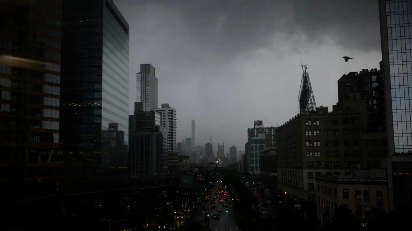 Dark clouds are seen during a thunder storm over Manhattan seen behind the Queensboro Bridge on August August 18, 2019 in New York City. Johannes EISELE / AFP