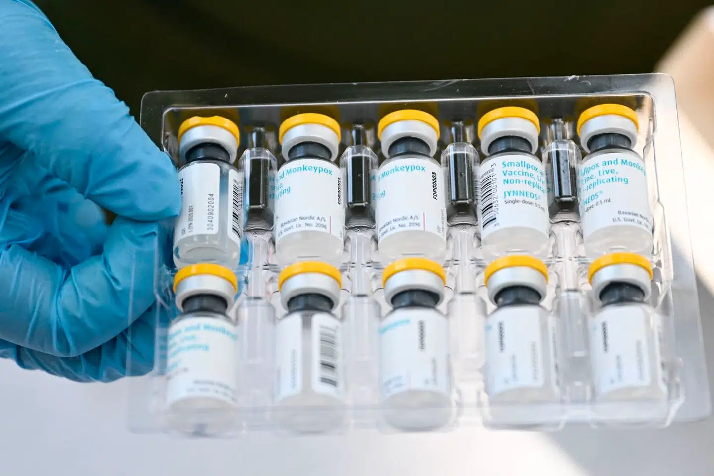 (FILES) This file photo taken on August 9, 2022 shows vials of the JYNNEOS Monkeypox vaccine are prepared at a pop-up vaccination clinic in Los Angeles, California. Shares of the pharmaceutical laboratories of Bavarian Nordic in Denmark, which manufactures a specific vaccine against the mpox, jumped up on August 15, 2024 following the decision of the World Organization of Health WHO to consider the resurgence of monkeypox cases together with an urgent need for health care in the world. A surging mpox outbreak in Africa, which was declared an emergency by the continent's health agency on August 13, is being driven by a new, more transmissible strain of the virus. The Africa Centres for Disease Control and Prevention (Africa CDC) declared its first-ever Public Health Emergency of Continental Security (PHECS) for the deadly disease. (Photo by Patrick T. FALLON / AFP)