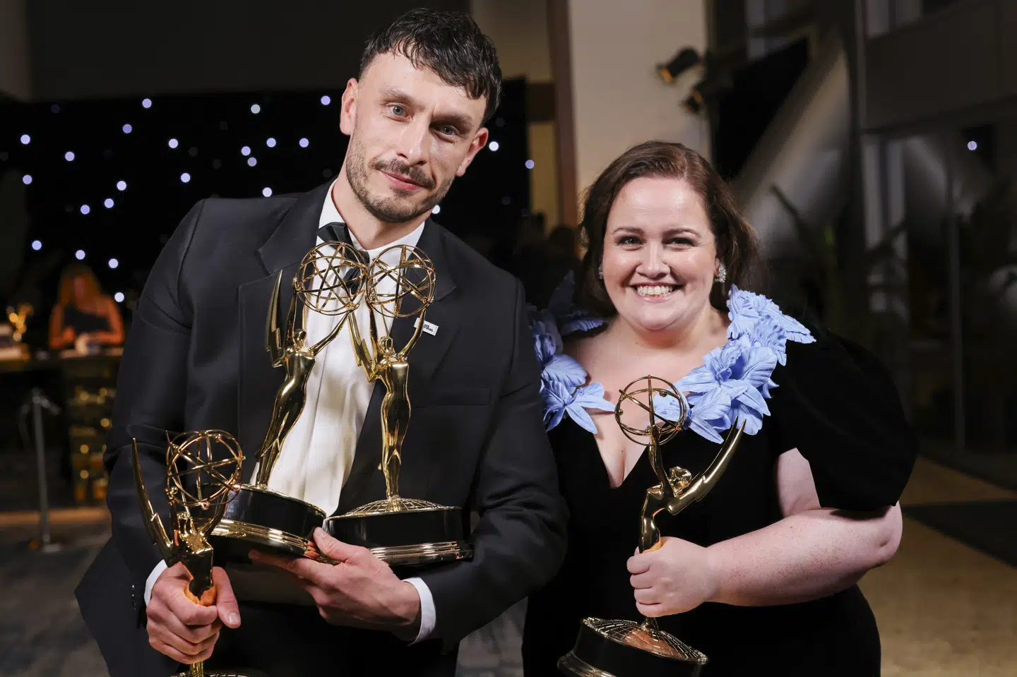 Richard Gadd, left, winner of the awards for outstanding lead actor in a limited or anthology series or movie, and outstanding limited or anthology series for "Baby Reindeer", and Jessica Gunning, winner of the awards for outstanding supporting actress in a limited or anthology series or movie, and outstanding limited or anthology series for "Baby Reindeer", pick up their official Emmy statuettes at the 76th Emmy Awards Trophy Table om Sunday, Sept. 15, 2024 at the Peacock Theater in Los Angeles. (Photo by Mark Von Holden/Invision for the Television Academy/AP Content Services)