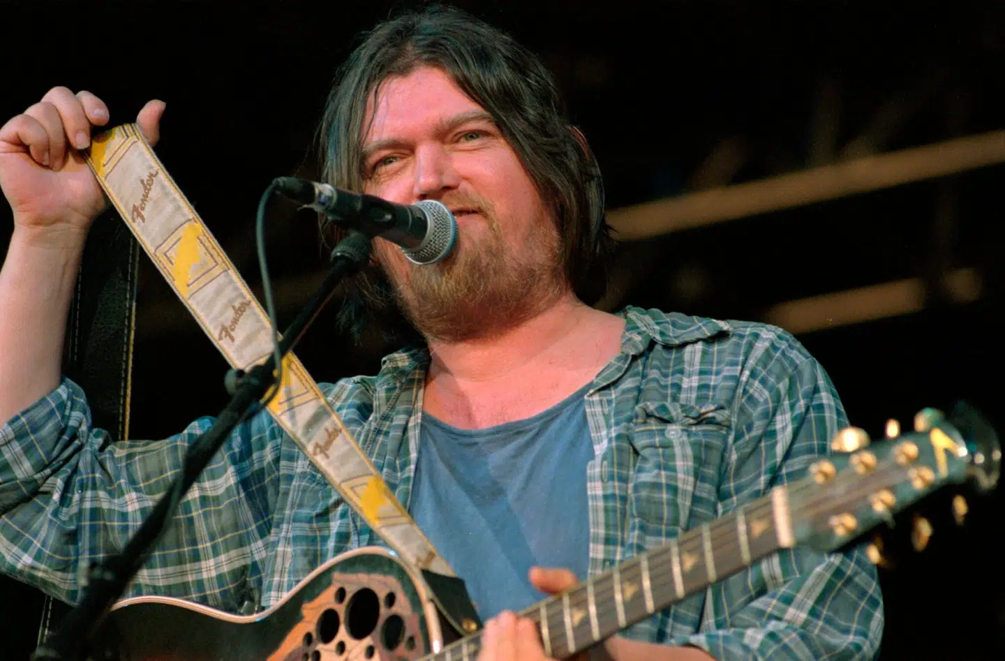 Johnny Madsen spillede tre gange på Roskilde Festival. Her ses han ved debuten i 1995.