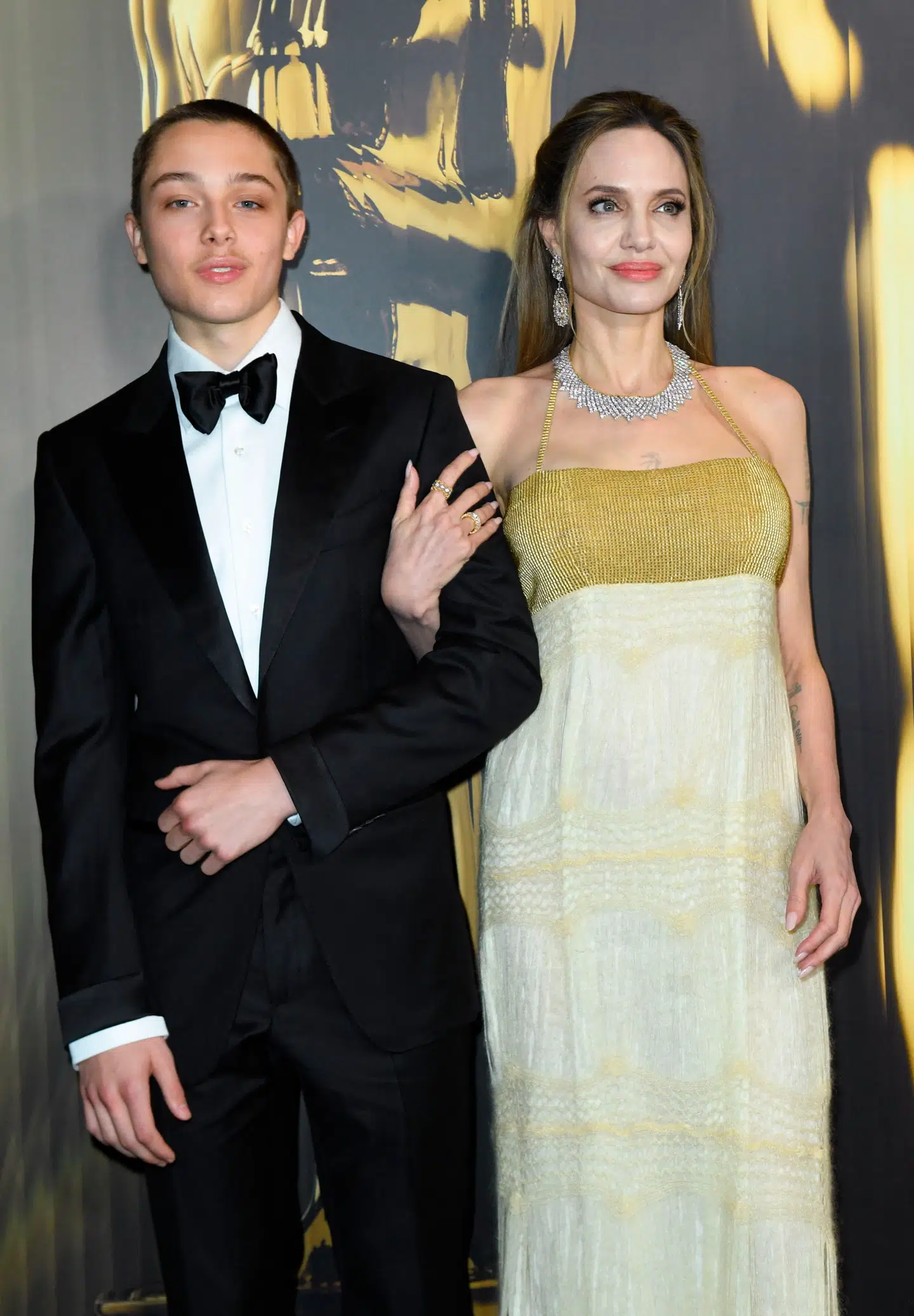 US actress Angelina Jolie and her son Knox Jolie-Pitt arrive for the Academy of Motion Picture Arts and Sciences' 15th Annual Governors Awards at the Ray Dolby Ballroom in Los Angeles on November 17, 2024. (Photo by VALERIE MACON / AFP)