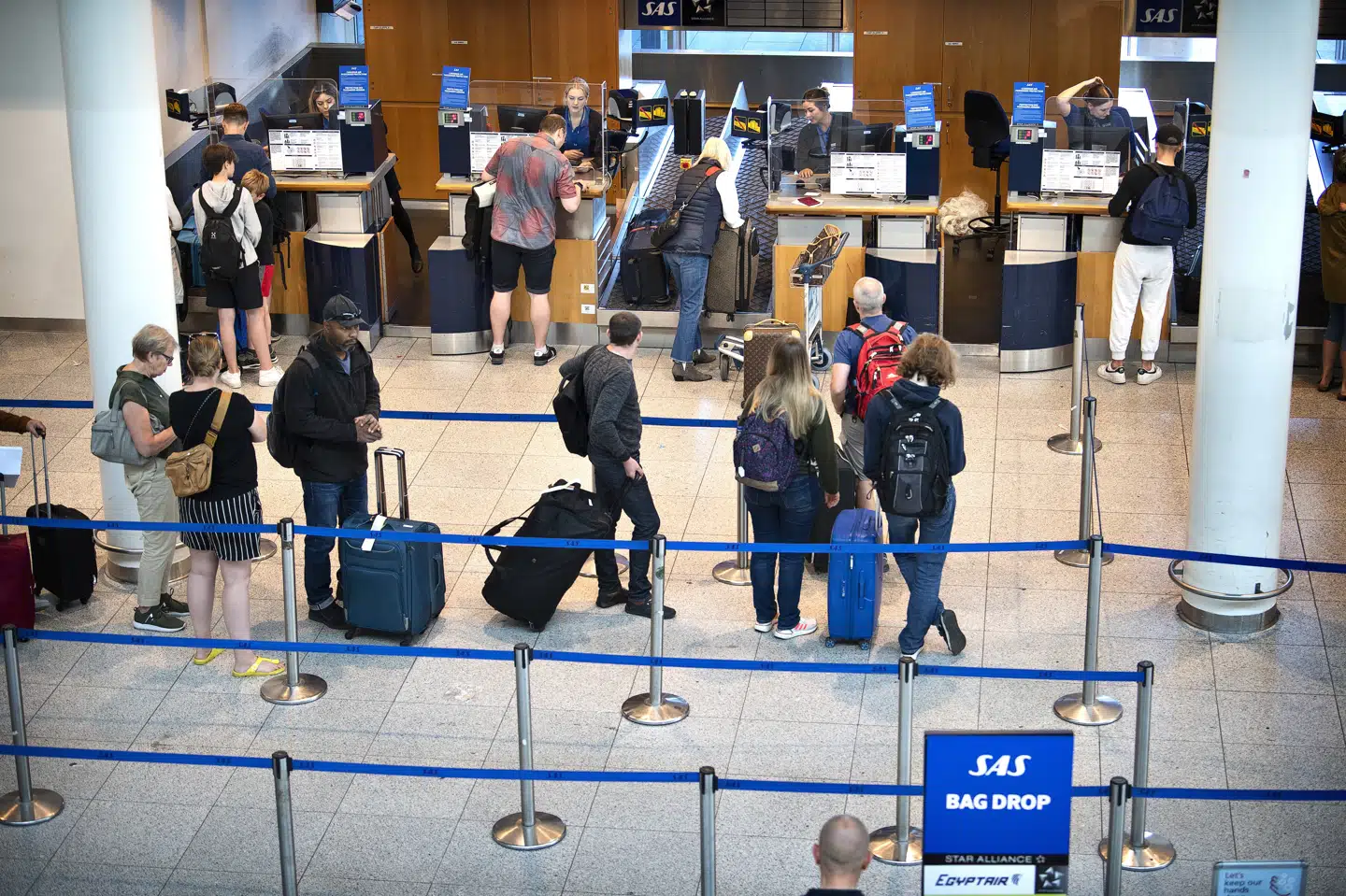 Der har været travlt ved check in-skrankerne i Københavns Lufthavn sidste år. Forventningen er, at endnu flere passagerer vil benytte lufthavnen i år - og derfor står rekorden fra 2018 måske for fald. (Arkivfoto).