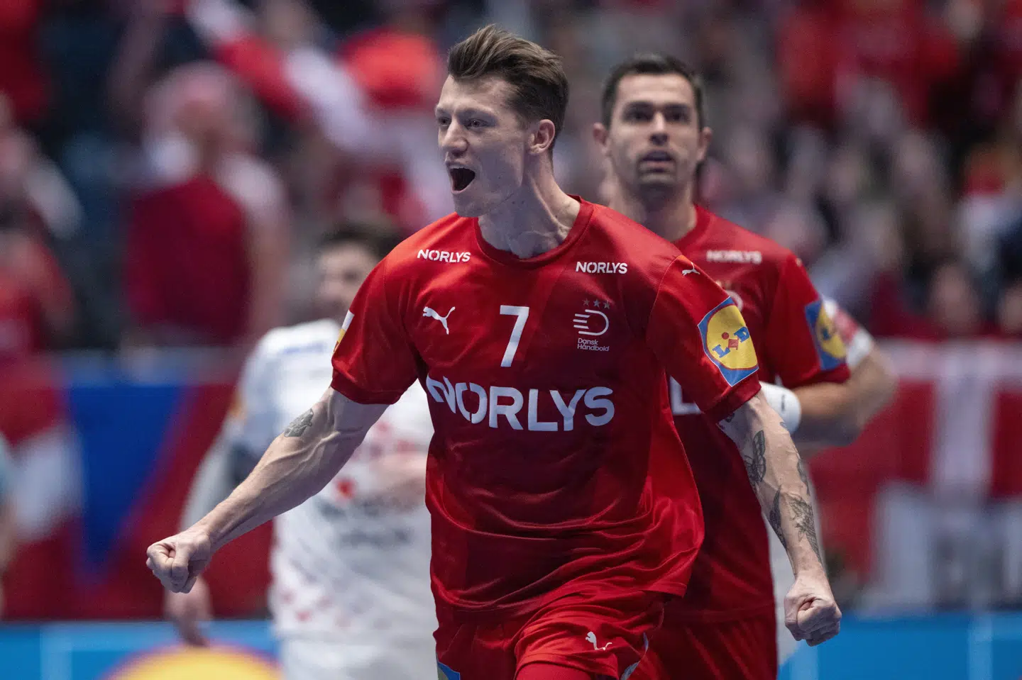 Fløjen Emil Jakobsen og resten af de danske håndboldherrer vandt igen VM-guld.