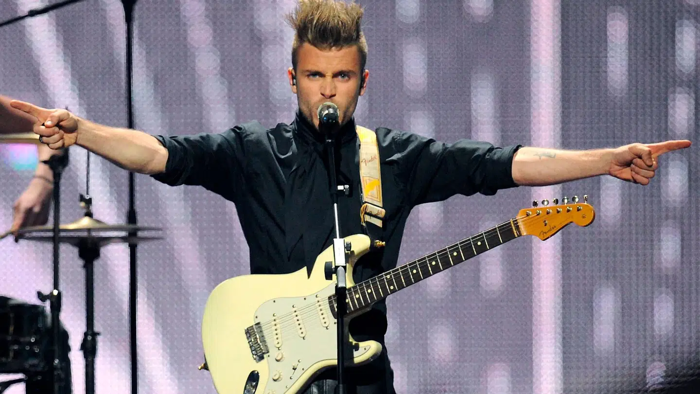 Tim Schou da han i 2011 vandt 'Dansk Melodi Grand Prix' som forsanger i gruppen A Friend in London.