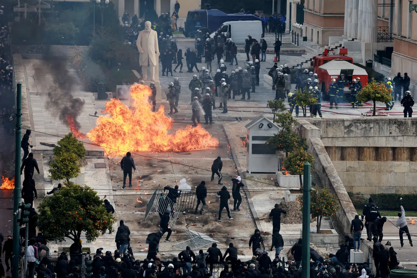 People clash with police near the Greek parliament at a protest marking the second anniversary of the country's worst railway disaster, while an investigation continues, in Athens, Greece, February 28, 2025. REUTERS/Louiza Vradi