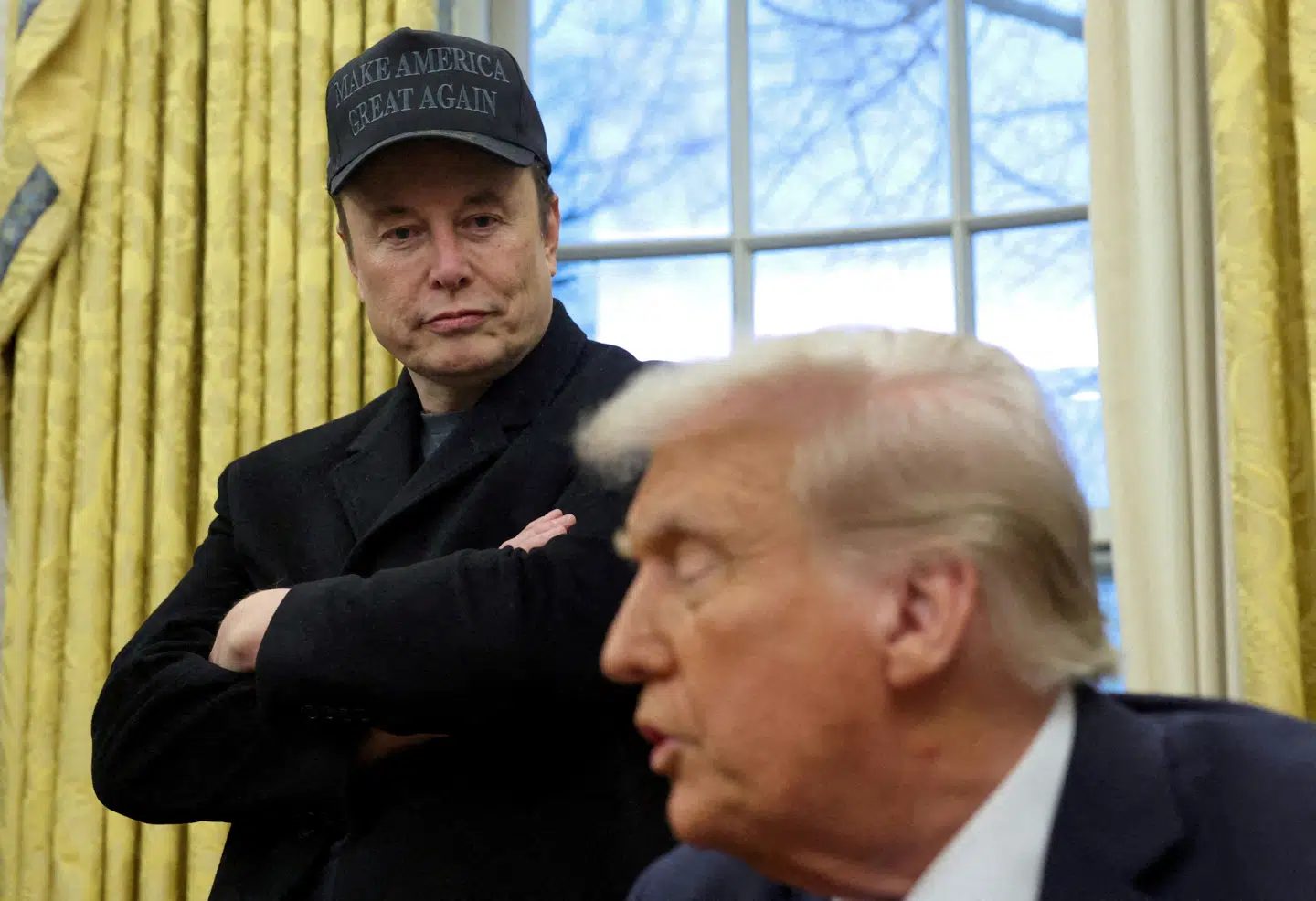 Elon Musk og Donald Trump på et pressemøde i Det Hvide Hus.