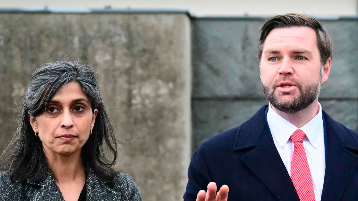 US Vice President JD Vance (C), his wife Usha Vance (L) and Abba Naor, a survivor of the Dachau concentration camp, stand together as they take part in a tour of the Dachau Concentration Camp memorial site in Dachau, southern Germany, on February 13, 2025. The US Vice President will participate in the Munich Security Conference (MSC). (Photo by Tobias SCHWARZ / AFP)