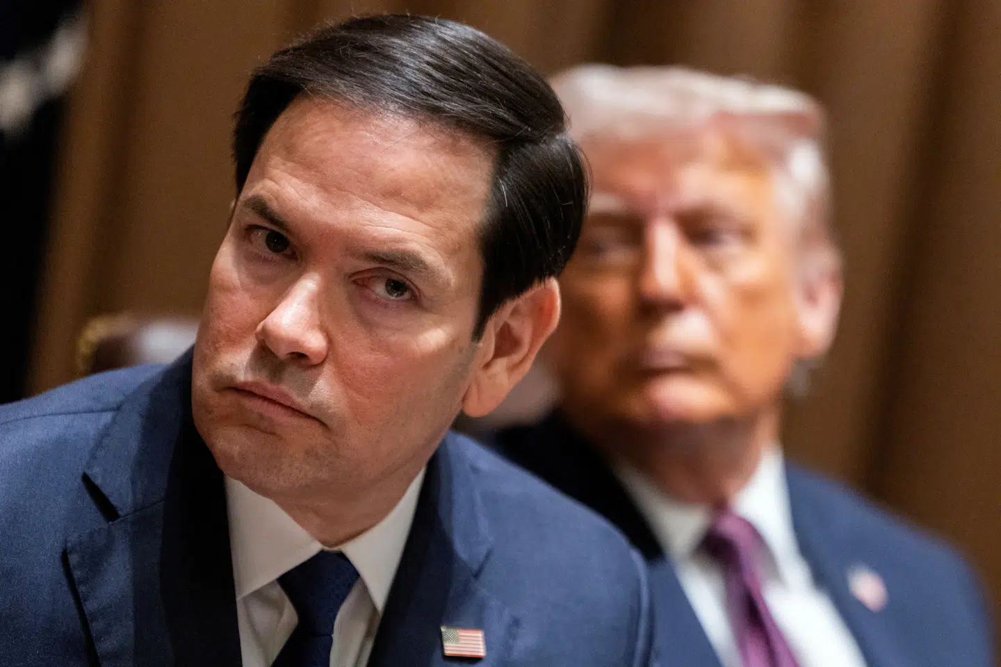 Udenrigsminister Marco Rubio (tv.) ses her med Donald Trump.