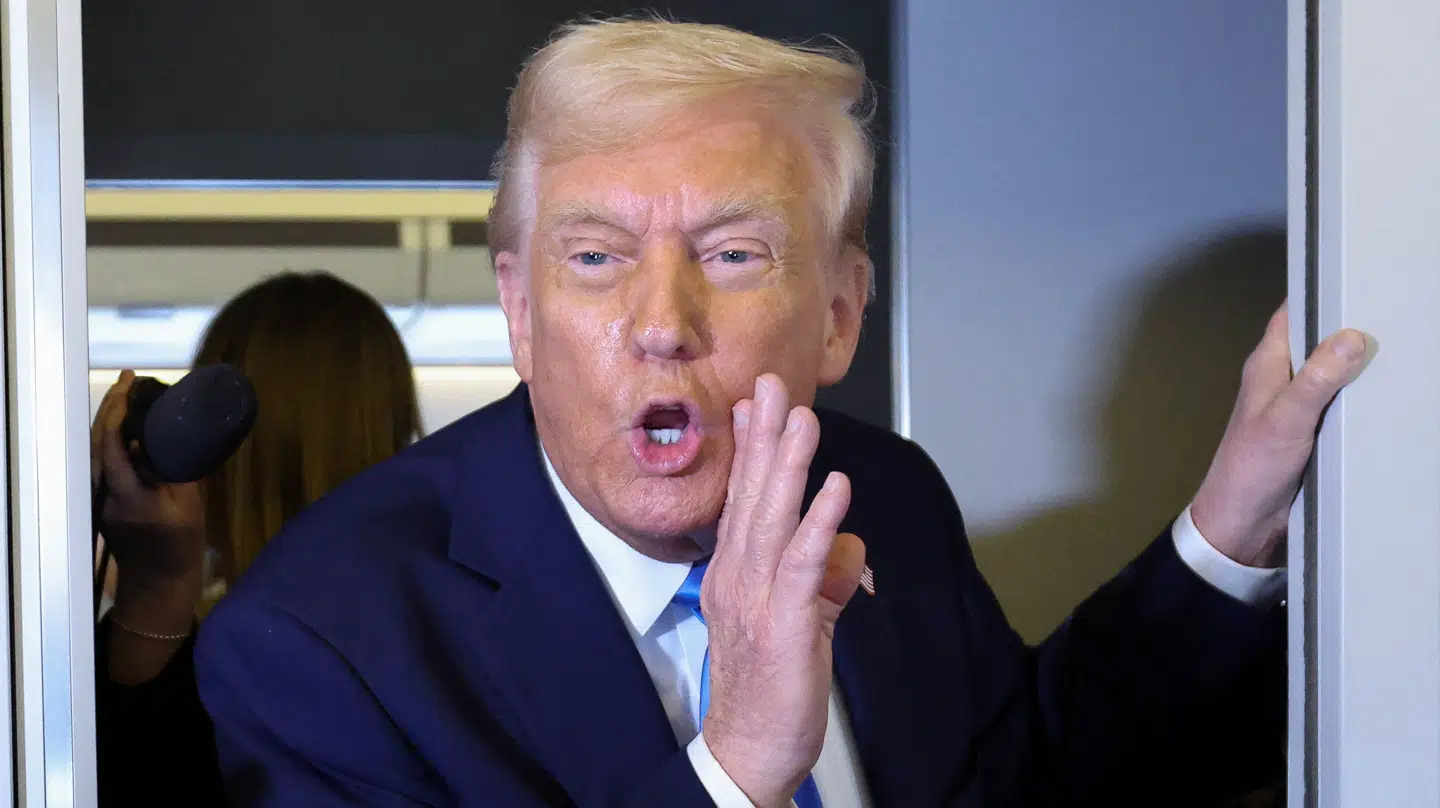 U.S. President Donald Trump speaks to members of the media aboard Air Force One before landing in West Palm Beach, Florida, U.S., March 28, 2025. REUTERS/Kevin Lamarque TPX IMAGES OF THE DAY