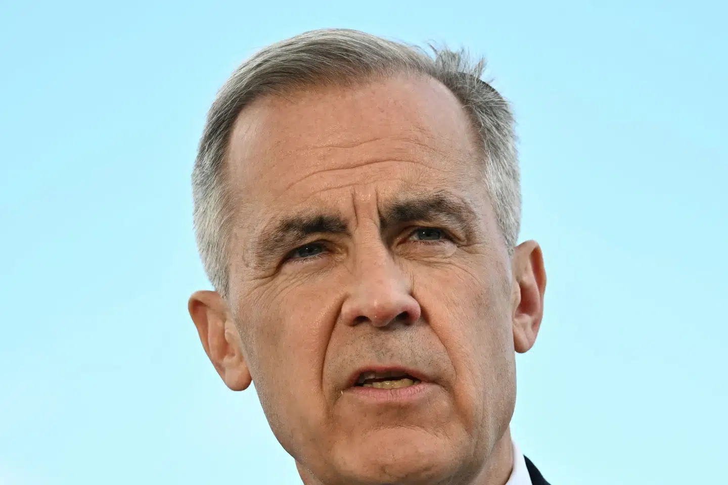 Mark Carney taler med journalister efter et møde med USA's præsident, Donald Trump.