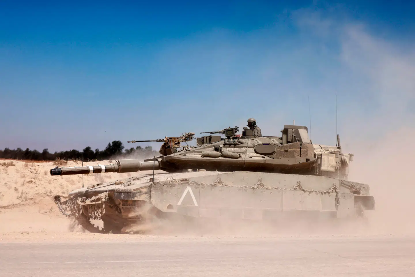 Den israelske regering truer med at besætteGazastriben, hvis ikke Hamas frigiver de israelske gidsler. Men islamisterne vil næppe hejse det hvide flag, siger eksperter.