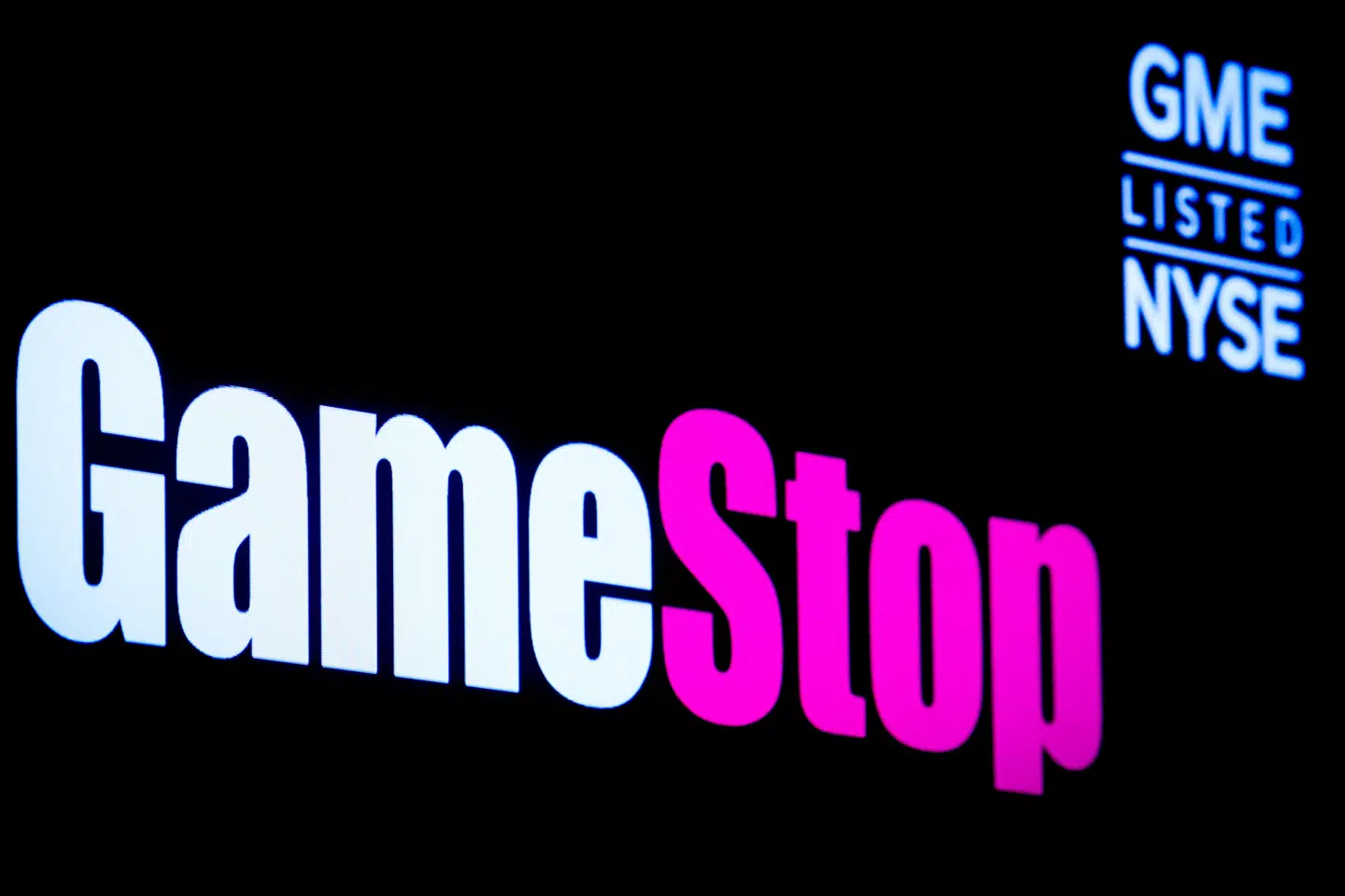 FILE PHOTO: A screen displays the logo and trading information for GameStop on the floor of the New York Stock Exchange (NYSE) in New York City, U.S., March 29, 2022. REUTERS/Brendan McDermid/File Photo