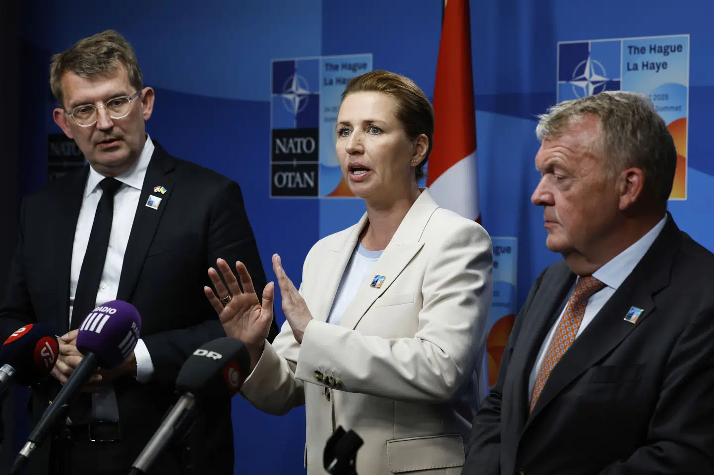 Regeringspartierne har set forskelligt på, hvordan en model for udenlandsk arbejdskraft skal se ud, men er nu blevet enige. Her ses Troels Lund Poulsen (V), Mette Frederiksen (S) og Lars Løkke Rasmussen (M) tidligere på ugen til Nato-topmødet i Haag.