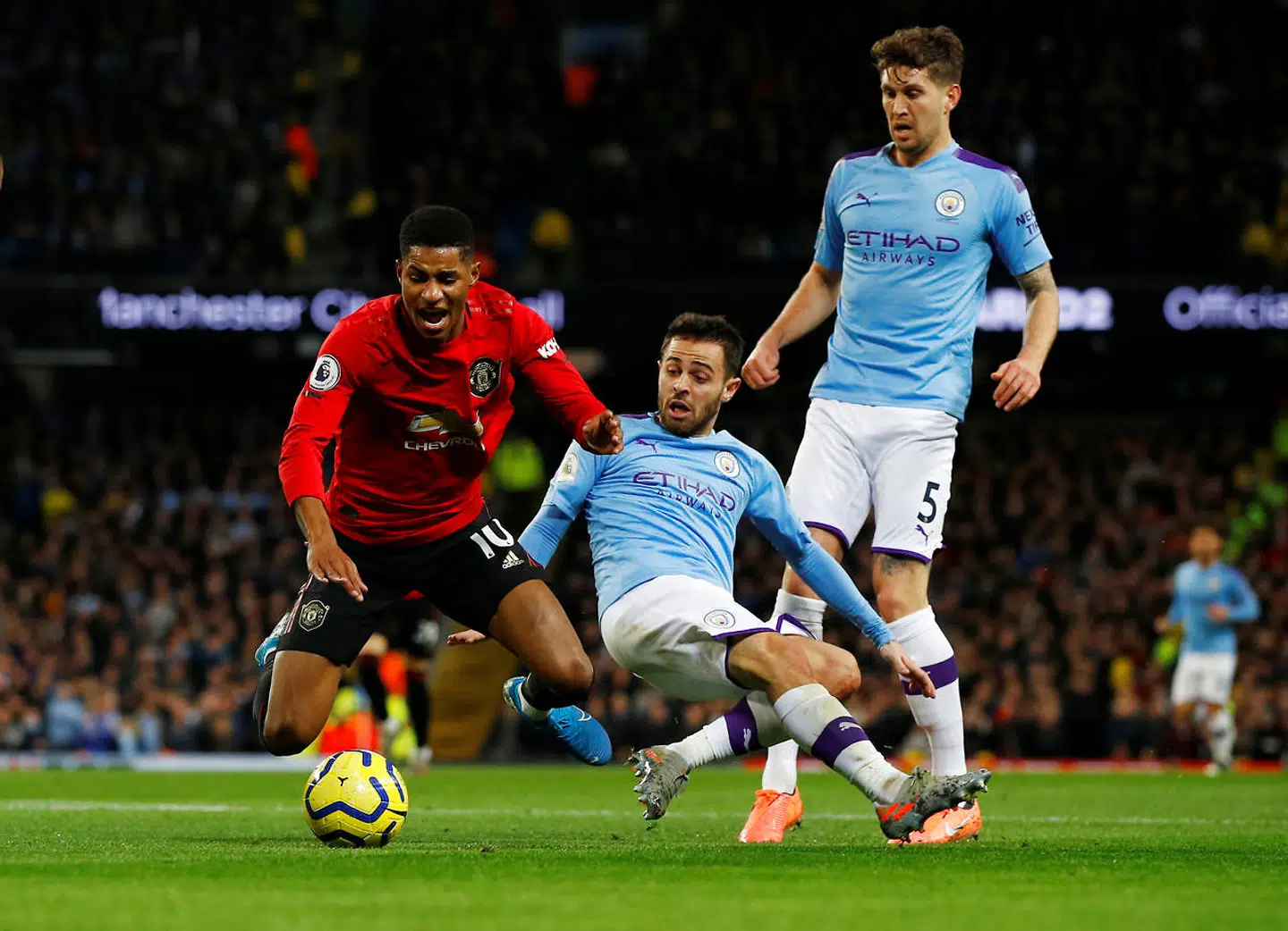 Soccer Football - Premier League - Manchester City v Manchester United - Etihad Stadium, Manchester, Britain - December 7, 2019 Manchester United's Marcus Rashford is brought down for a penalty REUTERS/Phil Noble EDITORIAL USE ONLY.No use with unauthorized audio, video, data, fixture lists, club/league logos or "live" services. Online in-match use limited to 75 images, no video emulation.No use in betting, games or single club/league/player publications. Please contact your account representative for further details.