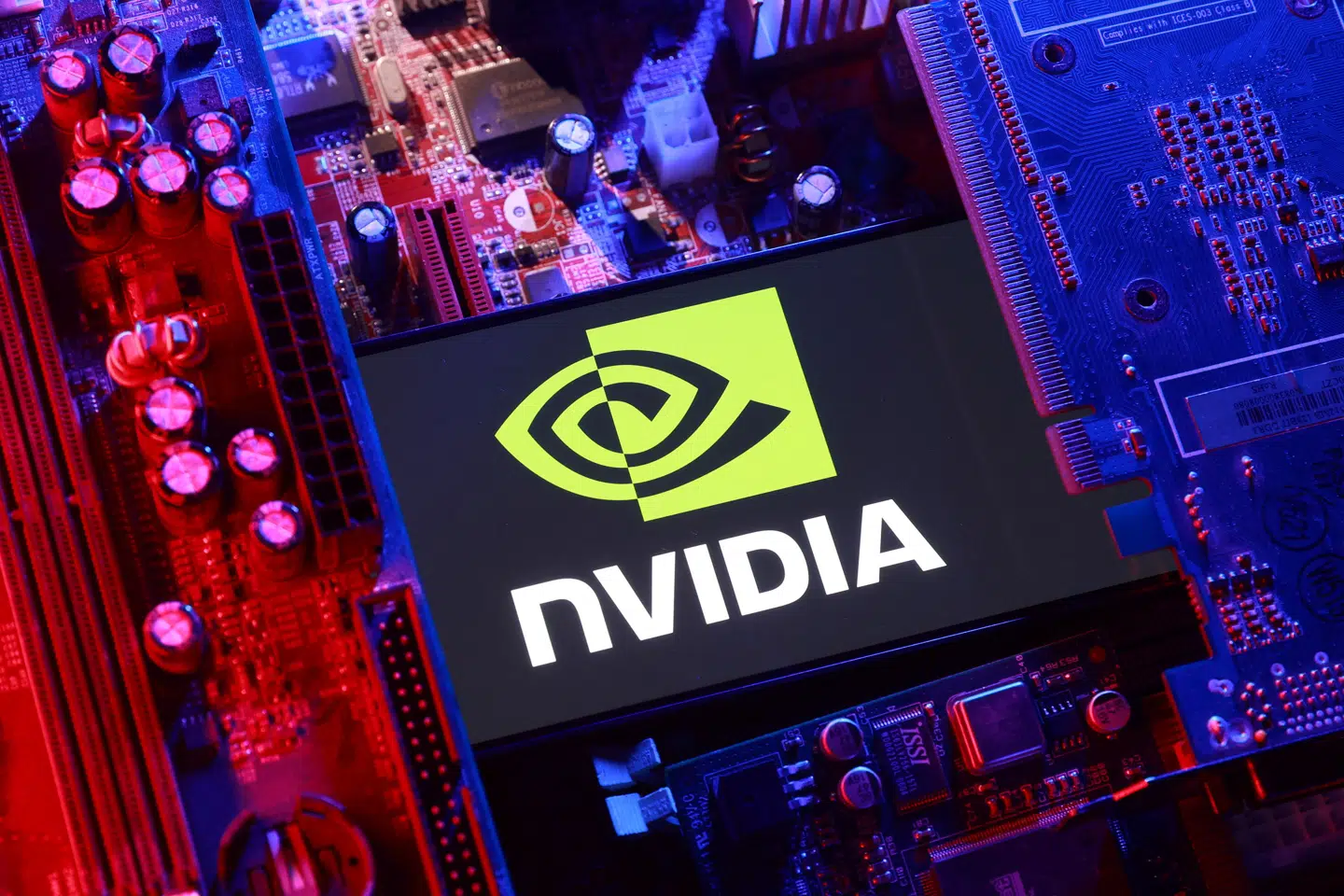An NVIDIA logo and a computer motherboard appear in this illustration taken August 25, 2025. REUTERS/Dado Ruvic/Illustration
