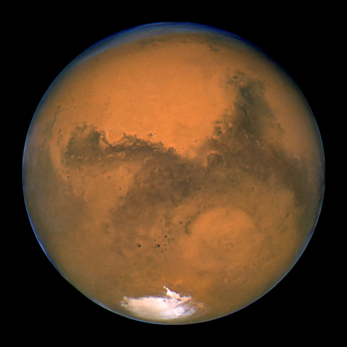 Afstanden mellem Jorden og Mars varierer, fordi de er i kredsløb. Men NASA anslår, at en rejse fra Jorden til Mars vil tage ni måneder. Foto: Nasa Nasa/Reuters/Ritzau Scanpix
