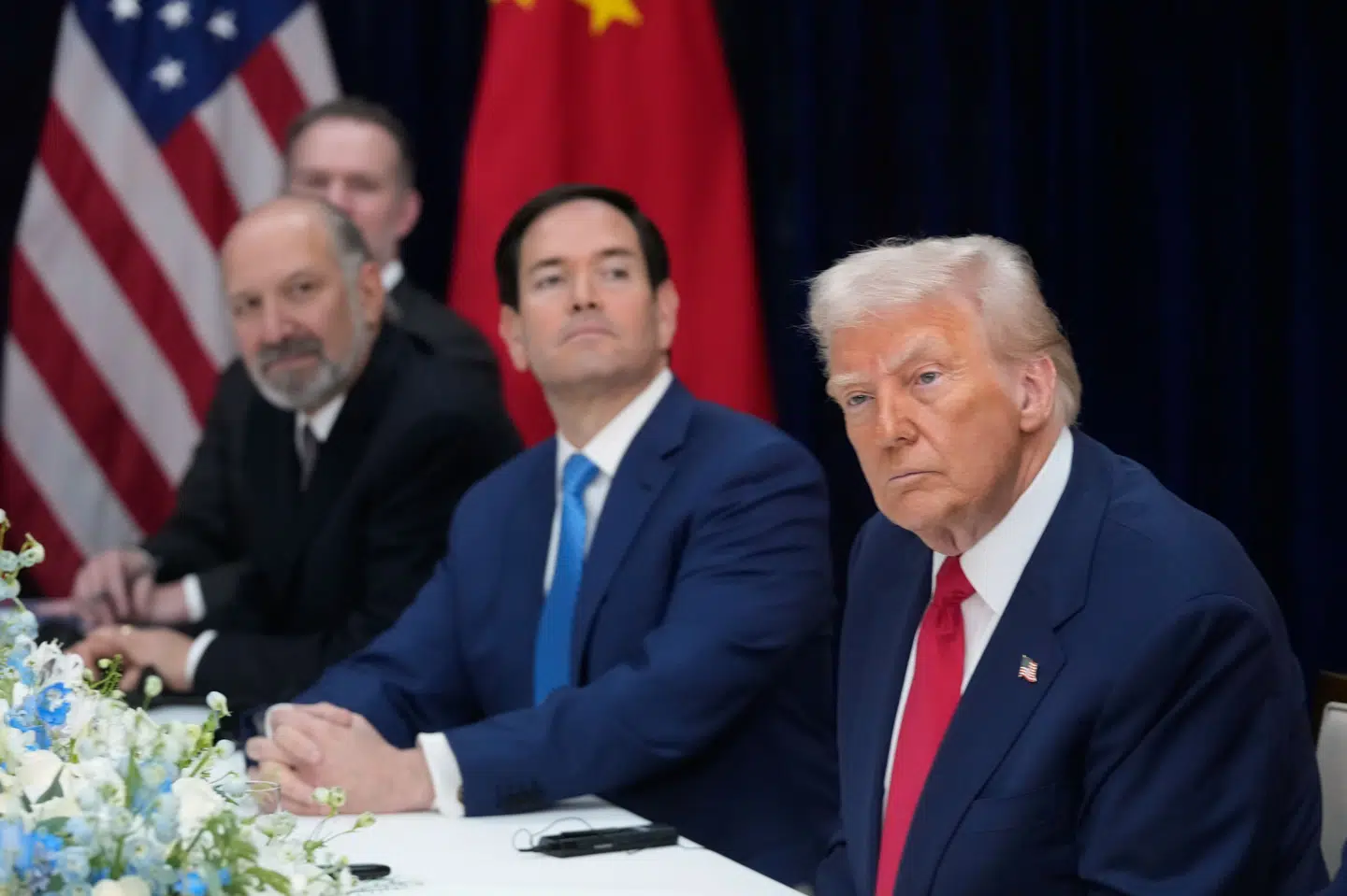USA's præsident, Donald Trump, og hans udenrigsminister, Marco Rubio, ses under mødet med Kinas præsident, Xi Jinping.