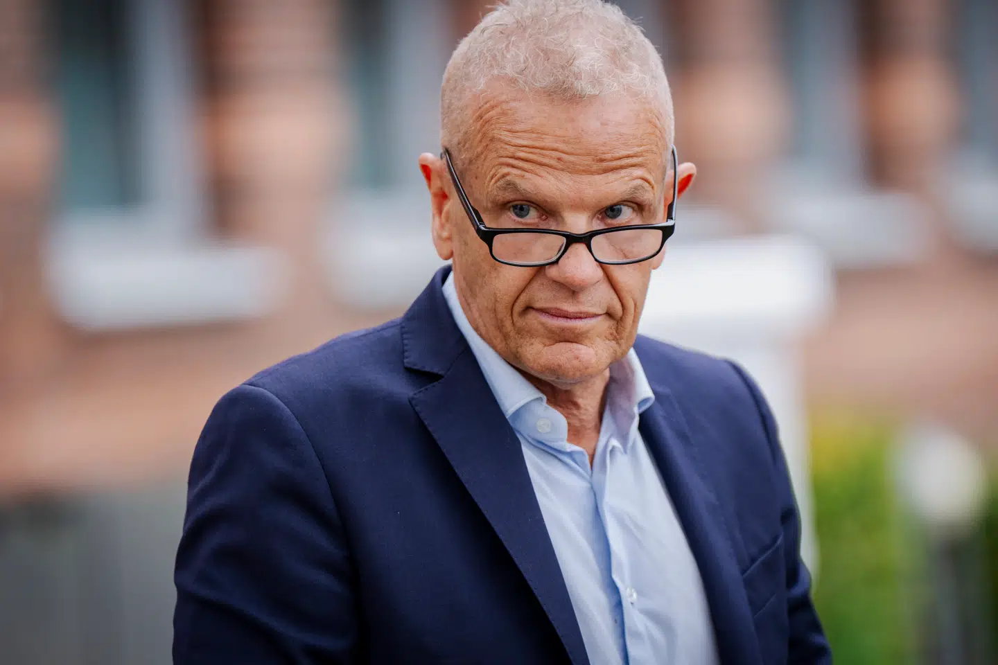 Lars Findsen efter første retsdag ved Retten i Lyngby 21. oktober. Den tidligere FE-chef hævder, at PETs chef krænkede ham ved at briefe toppolitikere om hans sexliv i forbindelse med sagen, hvor han var beskyldt for at lække statshemmeligheder.