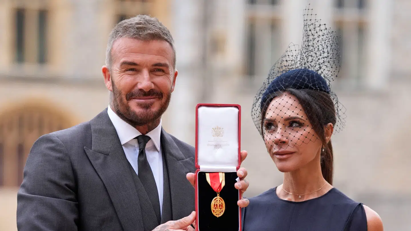 Sir David Beckham, stands with his wife Lady Victoria, after he was made a Knight Bachelor at an investiture ceremony at Windsor Castle, Berkshire. November 4, 2025. Andrew Matthews/Pool via REUTERS
