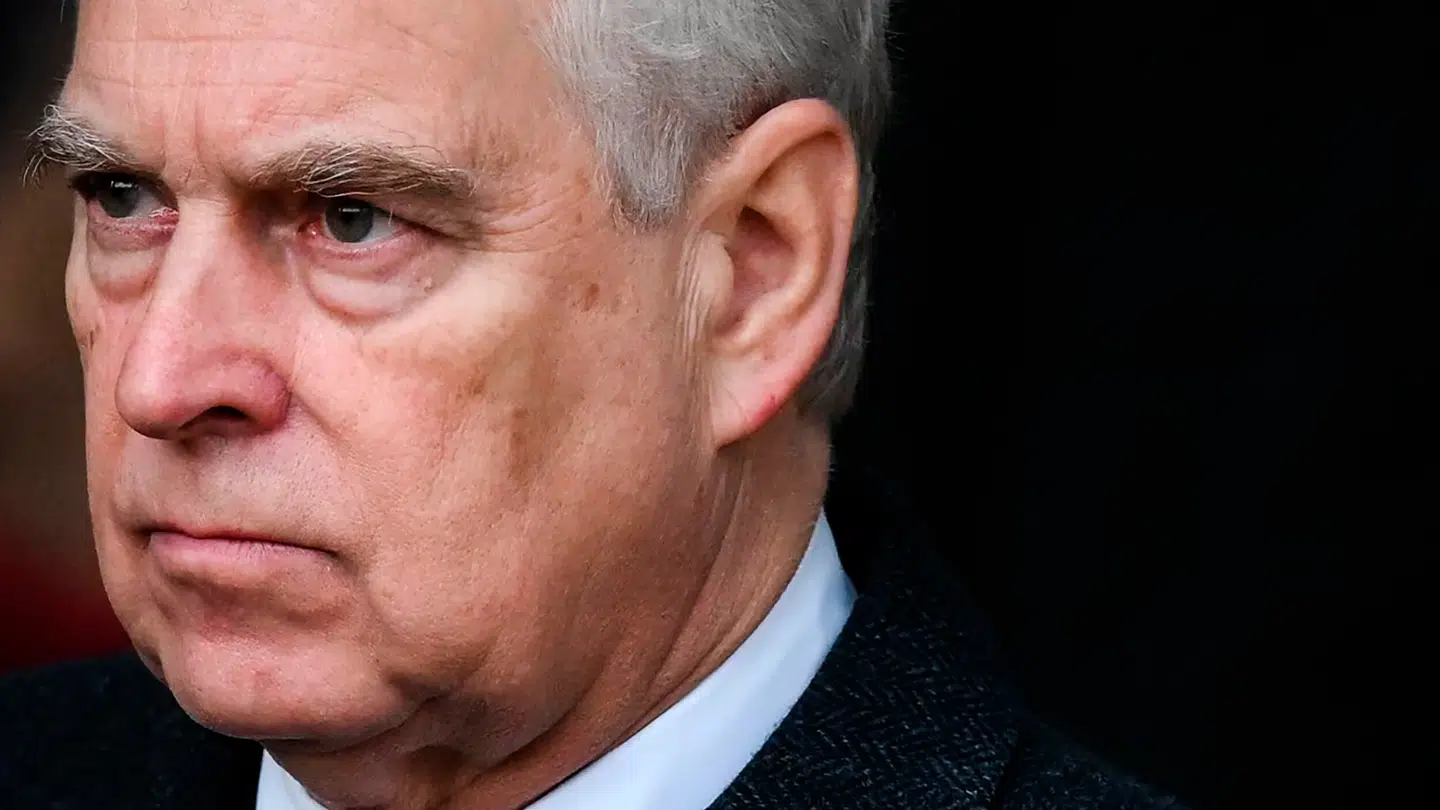 (FILES) (FILES) Britain's Prince Andrew, Duke of York reacts as he leaves at the end of the Royal Family's traditional Christmas Day service at St Mary Magdalene Church in Sandringham, Norfolk, eastern England, on December 25, 2022. King Charles will strip his younger brother Andrew of his royal titles and long-term residence on the Windsor estate, the palace said on October 30, 2025, the latest fallout to hit the scandal-plagued royal over the Jeffrey Epstein affair. "Prince Andrew will now be known as Andrew Mountbatten Windsor, " the palace said, adding that Charles had begun the formal process to strip the titles from his brother. (Photo by Daniel LEAL / AFP)