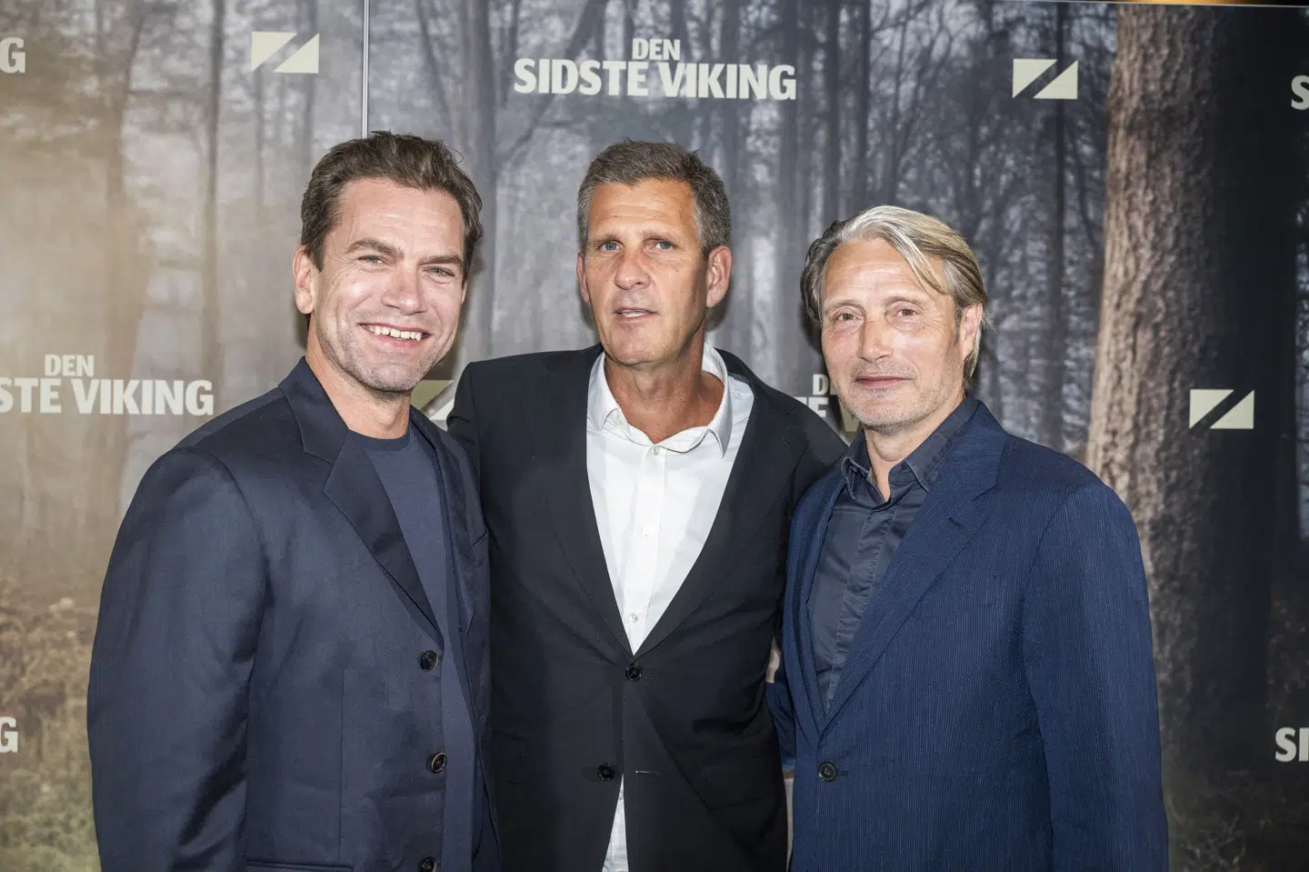 Mads Mikkelsen er tirsdag blevet nomineret til European Film Awards for sin rolle i filmen "Den sidste viking". Her ses han til filmens gallapremiere sammen med instruktør Anders Thomas Jensen og skuespiller Nikolaj Lie Kaas. (Arkivfoto).