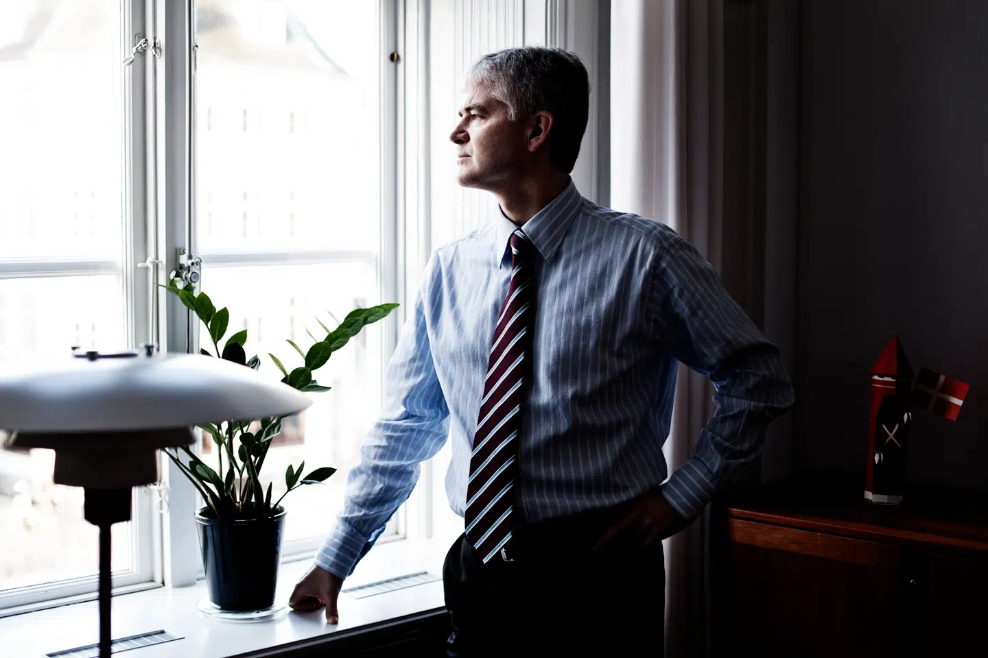 John Christiansen, der er topchef i Lån & Spar Bank, har fået blod på tanden efter nye kunder oven på den forestående storfusion mellem tre konkurrerende banker.