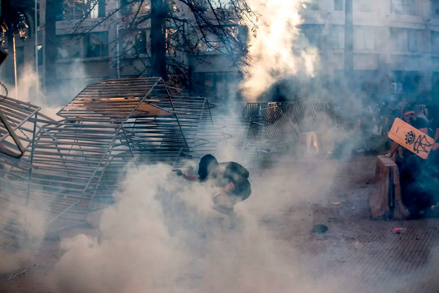I alt 29 personer har mistet livet i forbindelse med de seneste måneders store demonstrationer i Chile.(Photo by CLAUDIO REYES / AFP)