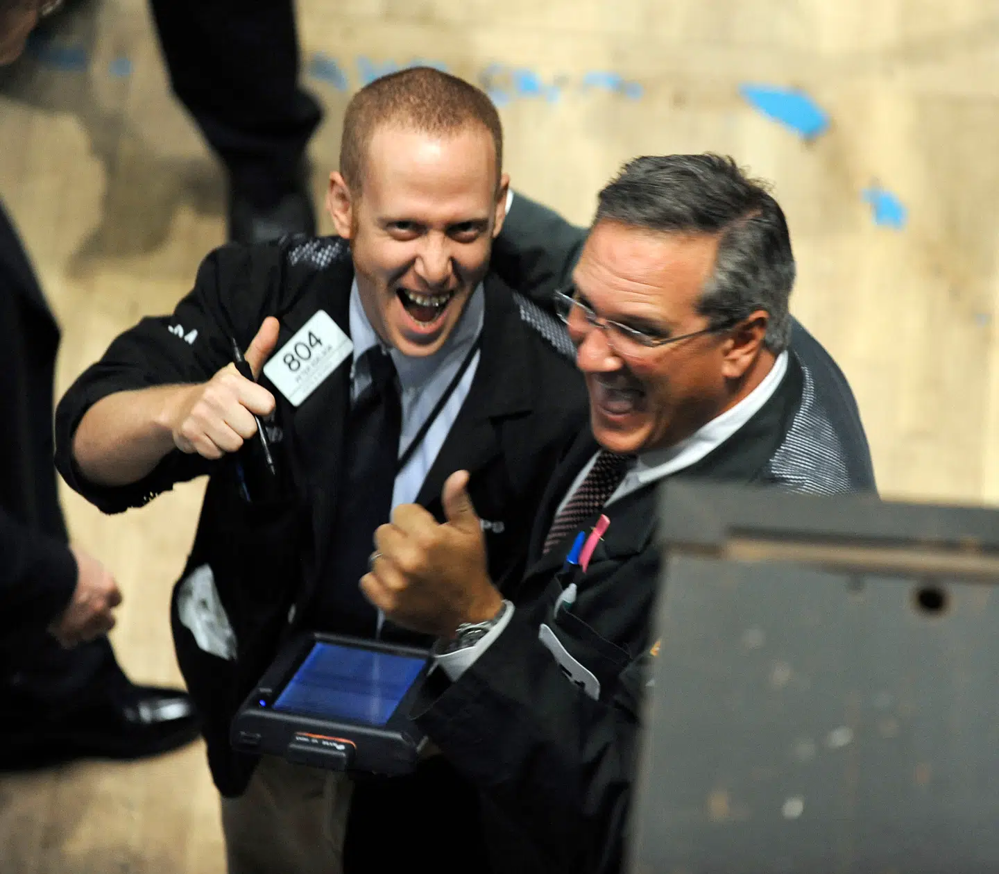 Traders celebrate on the floor of the New York Stock exchange October 13, 2008 in New York City at the closing bell. US stocks surged more than 11 percent, with the Dow index registering its biggest point gain ever as investors cheered governments' action plans to combat the global financial crisis. AFP PHOTO / TIMOTHY A. CLARY