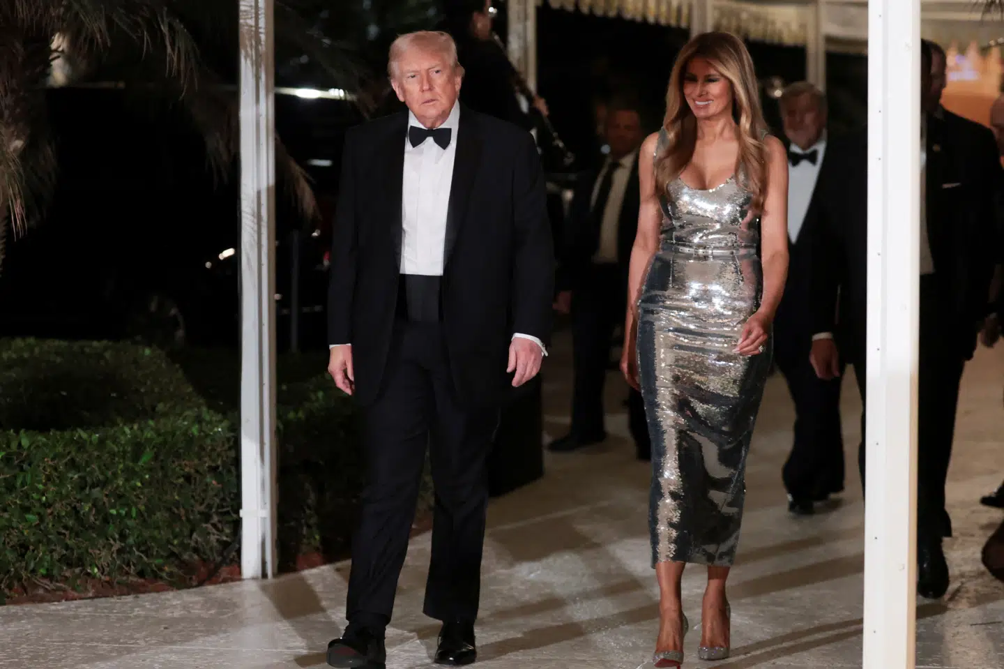 USA's præsident, Donald Trump, og den amerikanske førstedame, Melania Trump, ankommer til nytårsfesten på Mar-a-Lago i Florida.
