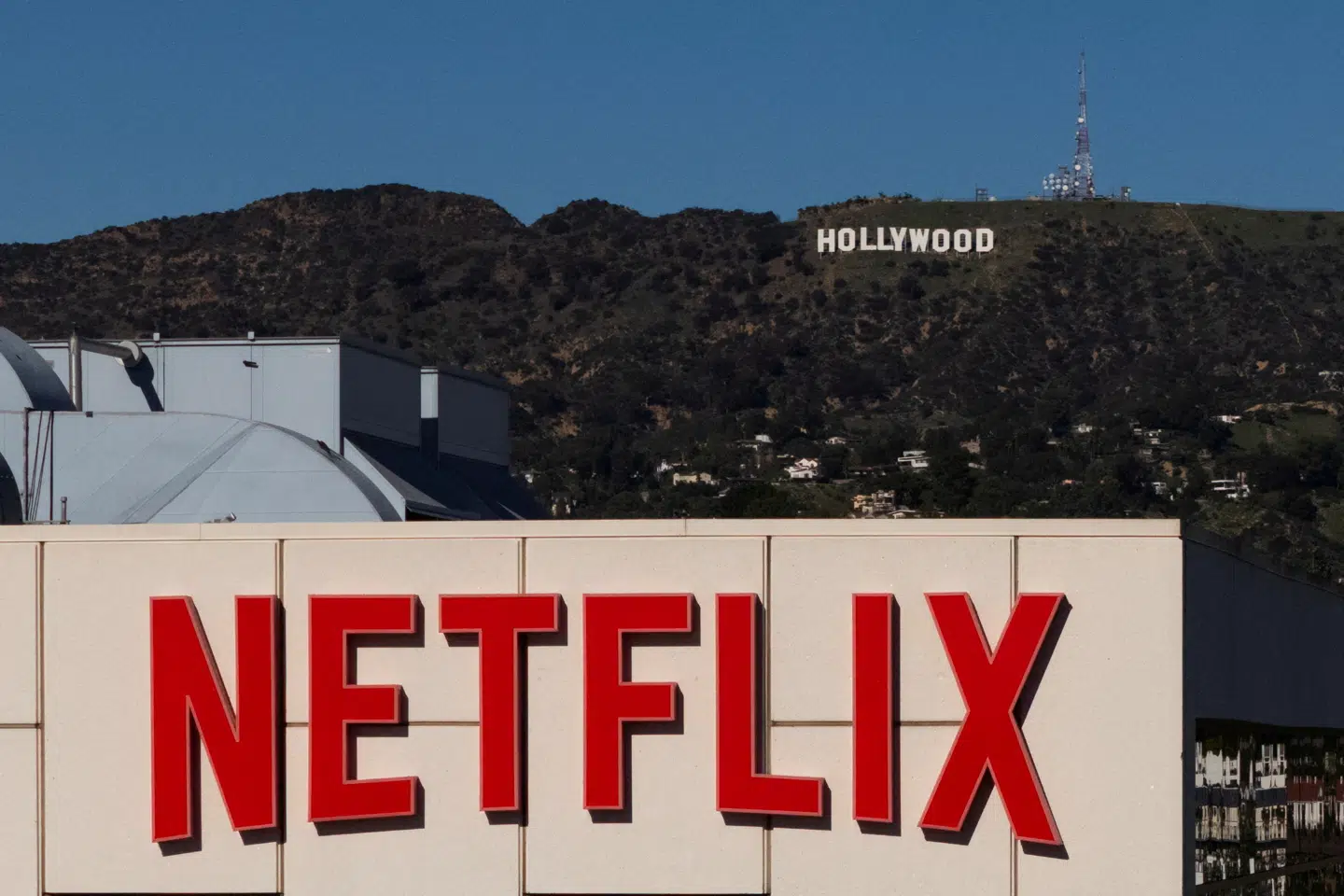 FILE PHOTO: A drone view shows the Netflix logo on one of their buildings in the Hollywood neighborhood of Los Angeles, California, December 8, 2025. REUTERS/Daniel Cole/File Photo