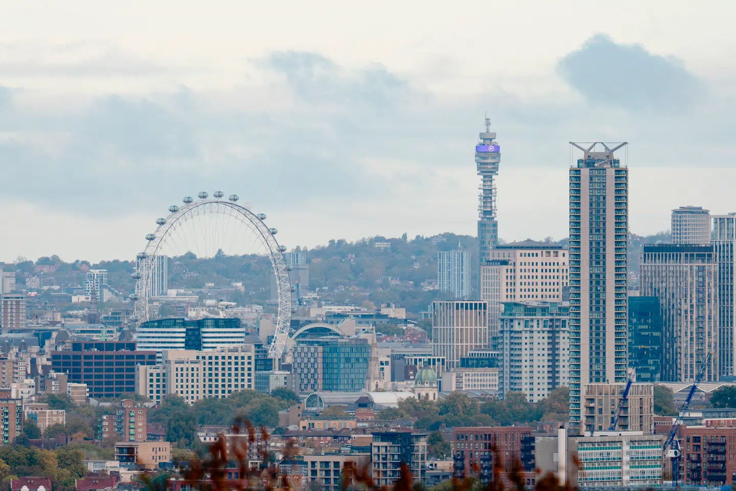 View of City of London skyline including the London Eye and BT Tower from One Tree Hill, Honor Oak, Southwark, London, UK - 25 October 2025