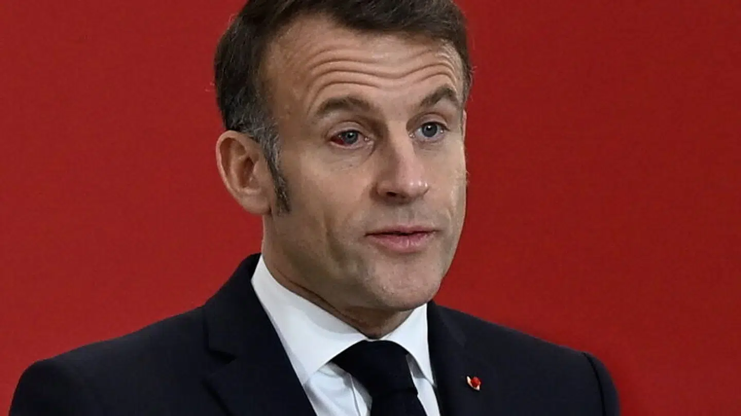 Her ses det røde øje tydeligt hos den franske præsident.