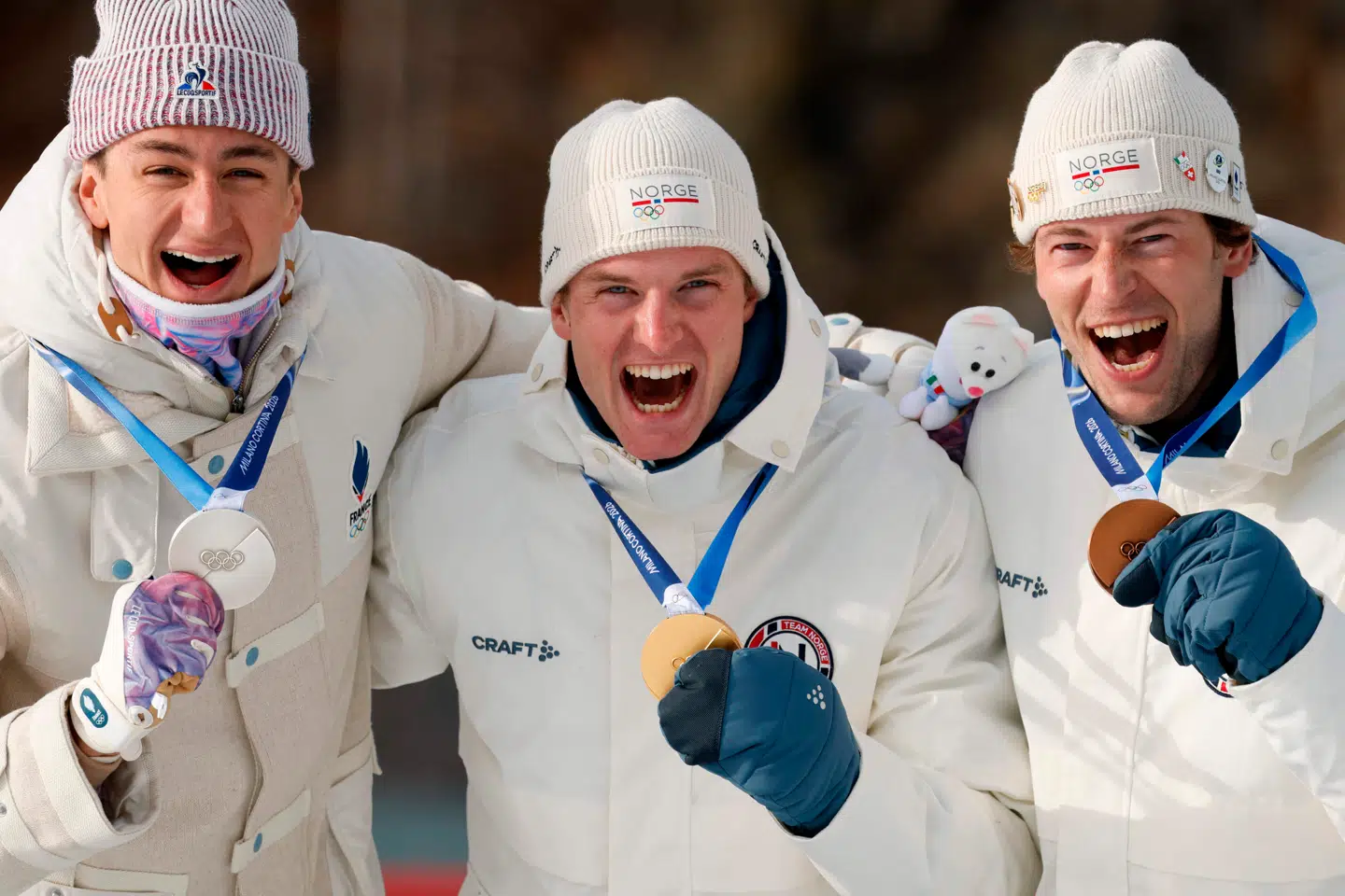 Her ses fra venstre: Franske Eric Perrot, der vandte sølv, norske Johan-Olav Botn, der vandt guld, og norske Sturla Holm Lægreid, som vandt bronze tirsdag.