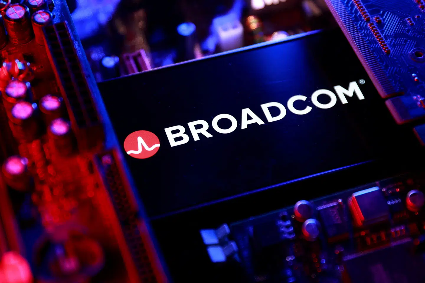 FILE PHOTO: A Broadcom logo and a computer motherboard appear in this illustration taken August 25, 2025. REUTERS/Dado Ruvic/Illustration/File Photo