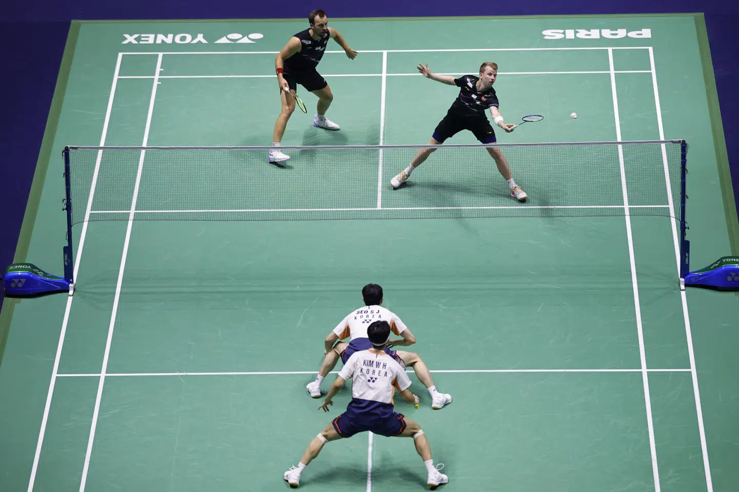 Badminton - BWF World Championships - Adidas Arena, Paris, France - August 30, 2025 Denmark's Kim Astrup and Anders Skaarup Rasmussen in action during their men's doubles semi final match against South Korea's Won Ho Kim and Seung Jae Seo REUTERS/Stephanie Lecocq