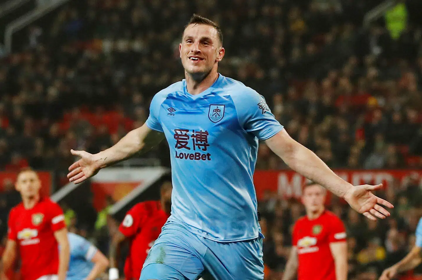 Soccer Football - Premier League - Manchester United v Burnley - Old Trafford, Manchester, Britain - January 22, 2020 Burnley's Chris Wood celebrates scoring their first goal REUTERS/Phil Noble EDITORIAL USE ONLY.No use with unauthorized audio, video, data, fixture lists, club/league logos or "live" services. Online in-match use limited to 75 images, no video emulation.No use in betting, games or single club/league/player publications. Please contact your account representative for further details.
