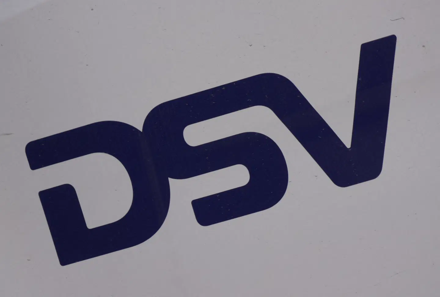 A logo for DSV is displayed on a van in the old city of Stockholm, Sweden, April 27, 2026. REUTERS/Tom Little
